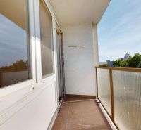 The balcony of a 3-room apartment on Šándorova Street in Bratislava - Ružinov with a view of greenery.