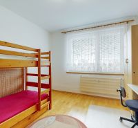 Children's room in a 3-room apartment, bunk bed, work desk, floor with wooden decor.