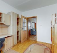 Children's room in a 3-room apartment with furniture and flooring featuring a wood design.