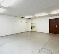 An empty storage space with a sink and white walls in Warehouses and halls.