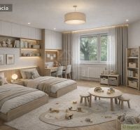 Children's room with two beds, wooden floor decor, and toys on the carpet.