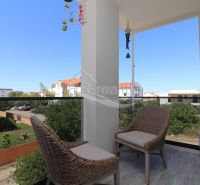 Balcony of the Holiday Apartment in Srima with a view of the surroundings and the garden.