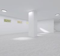 Large white interior with windows and a column suitable for commercial spaces.