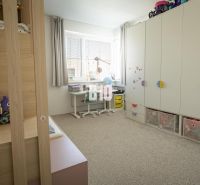 Children's room with a bunk bed and storage space in a 3-room apartment.