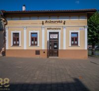 Restaurant on Castle Square in Kežmarok with a sign 
