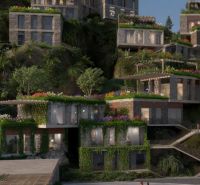 Villas in Dhërmi on the slope with terraces and lush greenery.