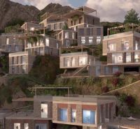 Stone villas built on the slope in Dhërmi with beautiful terraces and views.