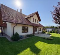 A family house in Trenčianska Turná with a sloped roof and a well-maintained garden.