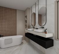 A bathroom in a family house with a bathtub, large mirrors, and sink faucets.