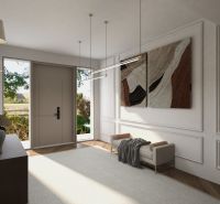 Interior of a family house with a hallway, art on the wall, and a wooden decor floor.