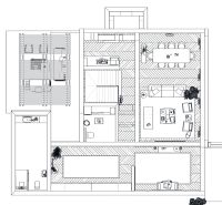 Floor plan of a family house with a wooden decor floor and various living spaces.