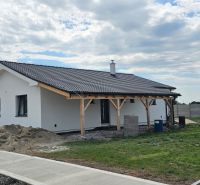 A family house in Bellova Ves with a shelter and a garden, surrounded by a fence.