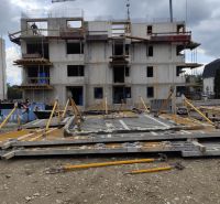 Construction site with an apartment building under construction in Beluša, ideal for a 3-room apartment.