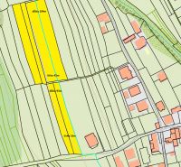 Cadastral map of residential plots in Nesluša with marked dimensions and parcels.