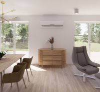 Kitchen and living room in a family house with a wooden decor floor, table, and chair.