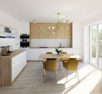 A kitchen in a family house with a dining table and a wooden decor floor.