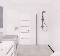 Bathroom in a family house with white tiles, a shower, and a washing machine.