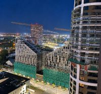 Night view of construction buildings and cranes in Bratislava - Staré Mesto on Továrenská.