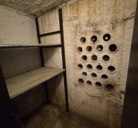 Wine cellar and rack in the cottage basement.