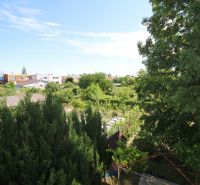 Gardens and greenery in Pezinok on Štúrova Street surround a 3-room apartment.