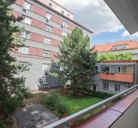 View from the balcony, residential building among trees on Škultétyho Street in Bratislava - Nové Mesto.
