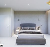 A bedroom with a gray bed and nightstands in a three-room apartment.
