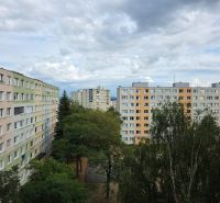 Apartment buildings among trees on Kysucká Street in Košice - West district.