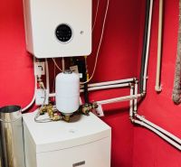 Heating in a family house with Bosch brand equipment and distribution systems.