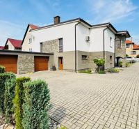A family house in Radobica with a garage and a landscaped garden on a spacious plot.