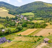 Residential plots in Lysá pod Makytou on Strelenka Street with a view of the hills.