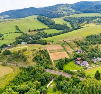 Residential plots at Strelenka in Lysá pod Makytou, surrounded by greenery and hills.