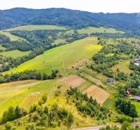 Residential plots in Lysá pod Makytou on Strelenka Street, surrounded by greenery and hills.