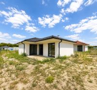 A family house in the village of Most pri Bratislave with a vacant plot and garden.