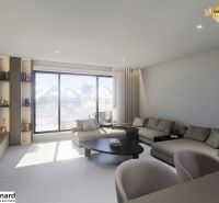Living room of a 3-room apartment with large windows and a comfortable sofa set.