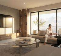 Living room with a corner sofa, wooden decor flooring, and a large window in a 2-room apartment.