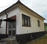A family house in Trenčín with a sloped roof and plaster facade.