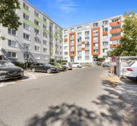 Parking in front of residential buildings on Čiližská Street in Bratislava, Vrakuňa district.
