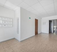 Apartment entrance with mailboxes and doors in Bratislava on Čiližská Street.