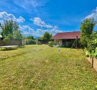 Gardens at Žabí majer in Bratislava - Rača with a small house, swing, and lawn.