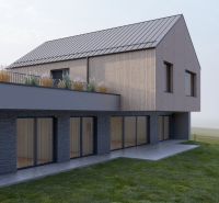 A family house in Staškov with a terrace and a garden on a grassy plot.