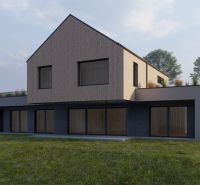A family house in Staškov with wooden decor on a slope surrounded by greenery and trees.