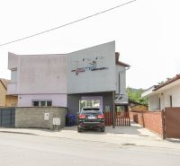 A family house on Kubranská Street in Trenčín with a garage and a driveway.