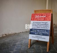 Office space for rent on a floor with tiles.