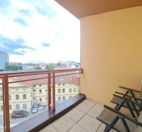 The balcony of a 2-room apartment with a view of Štefánikova Street in Poprad.