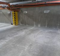 Underground parking with marked spots G27, G28 on Štefánikova Street in Poprad.