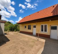 A family house on Orechova Street in Brestovany with a garden and a red roof.