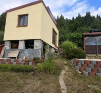 Cottage on Tulská in Banská Bystrica with a terrace, garden, and bordering the forest.