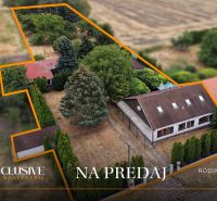 A family house in Lipové surrounded by greenery and a well-maintained garden for sale.
