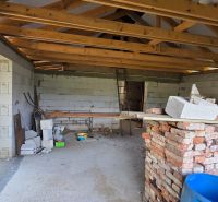 Construction of a family house in Kokšov-Bakša with bricks and a gable roof.