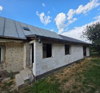 A family house in Kokšov-Bakša during renovation with incomplete facade cladding.